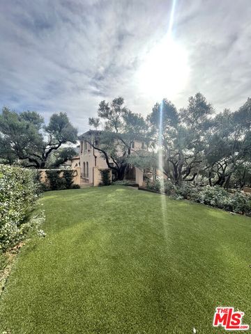 a room with a dresser and a mirror