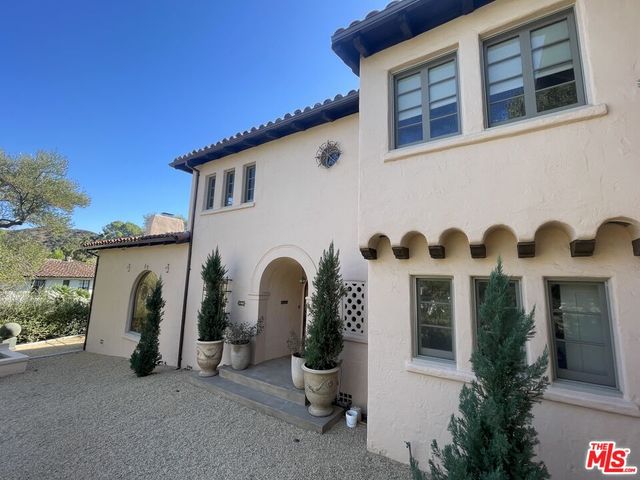 a view of swimming pool from a balcony