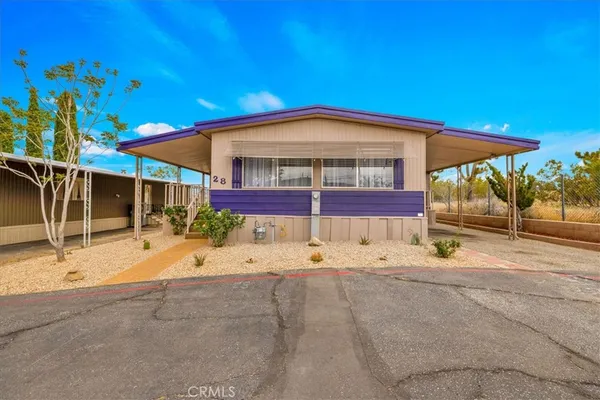 a view of a house with a patio
