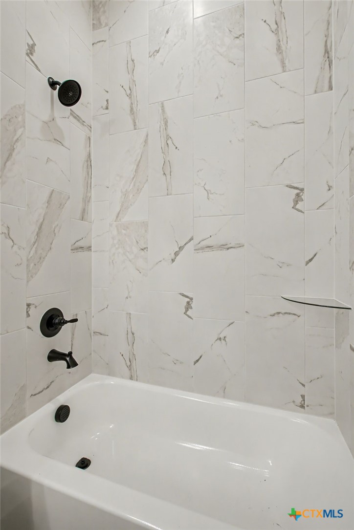 425 County Road 3152 Kempner, TX 76539 - Photo 21 of 27 a bathroom with a tub