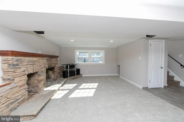 a view of livingroom and fireplace