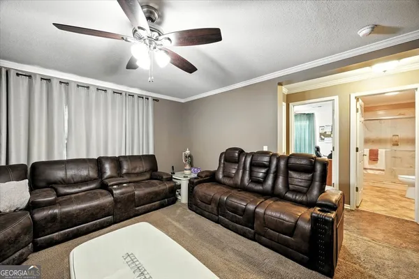 a patio with table and chairs