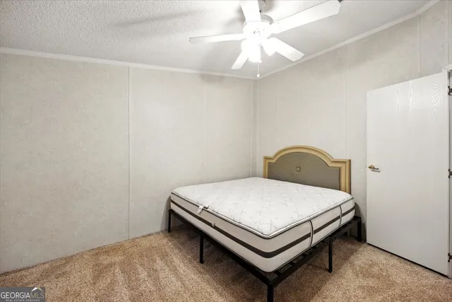 an aerial view of a house with yard swimming pool and outdoor seating