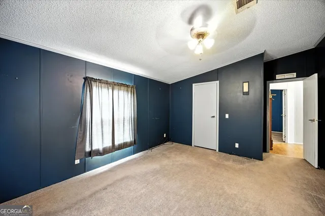 a view of a lake with mountains in front of it