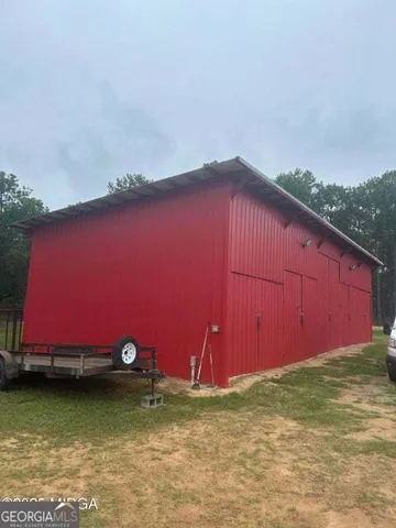 a view of swimming pool with a yard