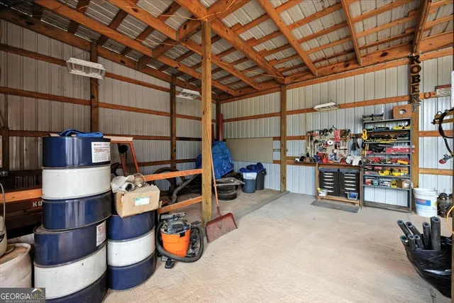 a view of a swimming pool with a yard