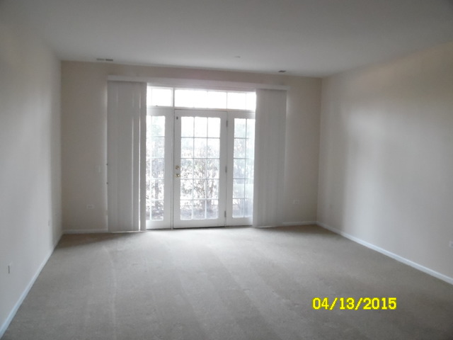 660 McHenry Road, Unit 102 Wheeling, IL 60090 - Photo 2 of 10
