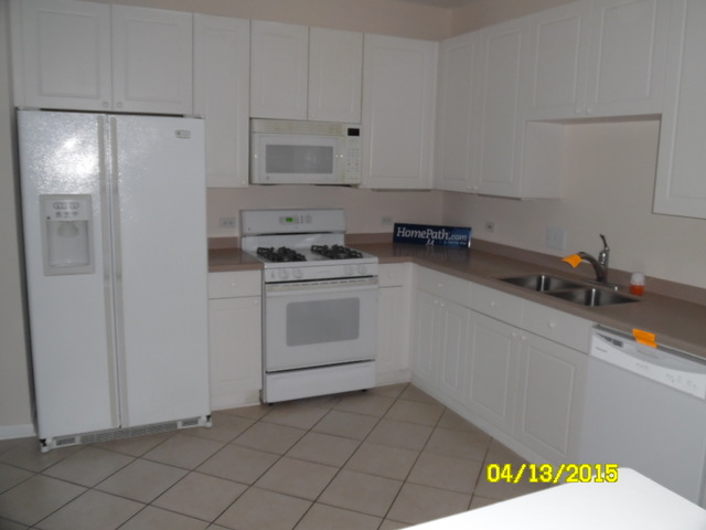 660 McHenry Road, Unit 102 Wheeling, IL 60090 - Photo 3 of 10