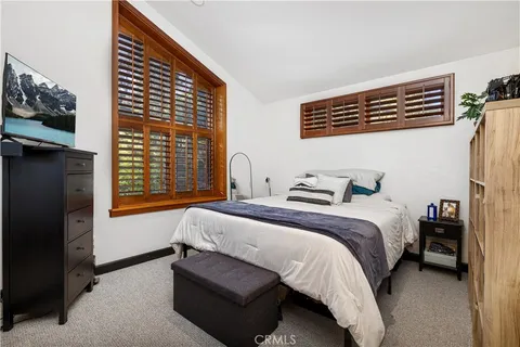 a view of a park with large trees