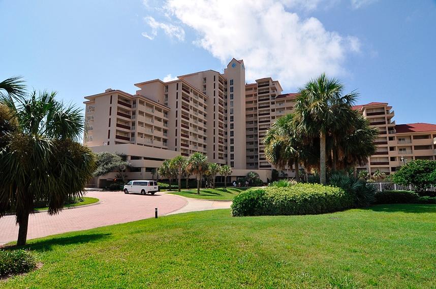 9011 Highway 98, Unit 701 Miramar Beach, FL 32550 - Photo 3 of 13 a view of building with yard and swimming pool