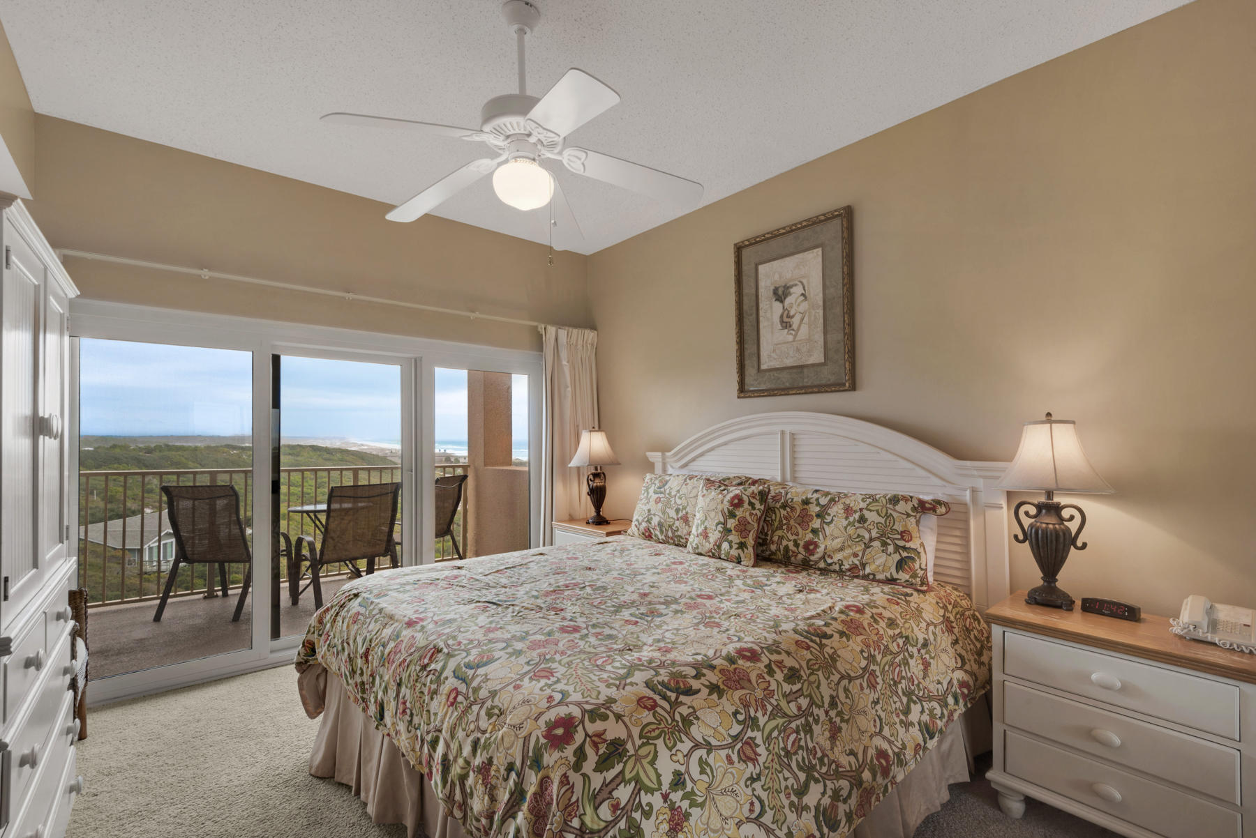 9011 Highway 98, Unit 701 Miramar Beach, FL 32550 - Photo 8 of 13 a bedroom with a large bed and a large window