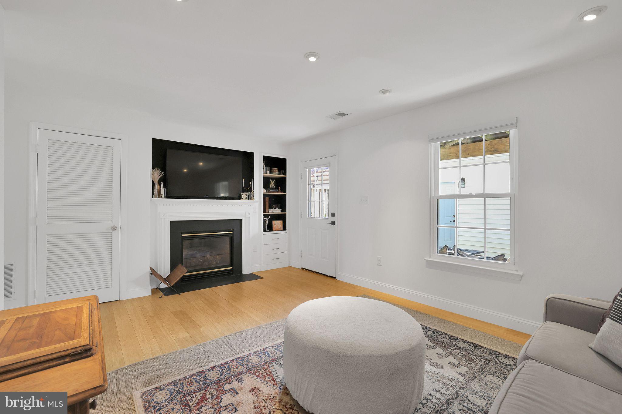 22952 Regent Terrace Sterling, VA 20166 - Photo 46 of 64 a spacious bedroom with a bed and a television