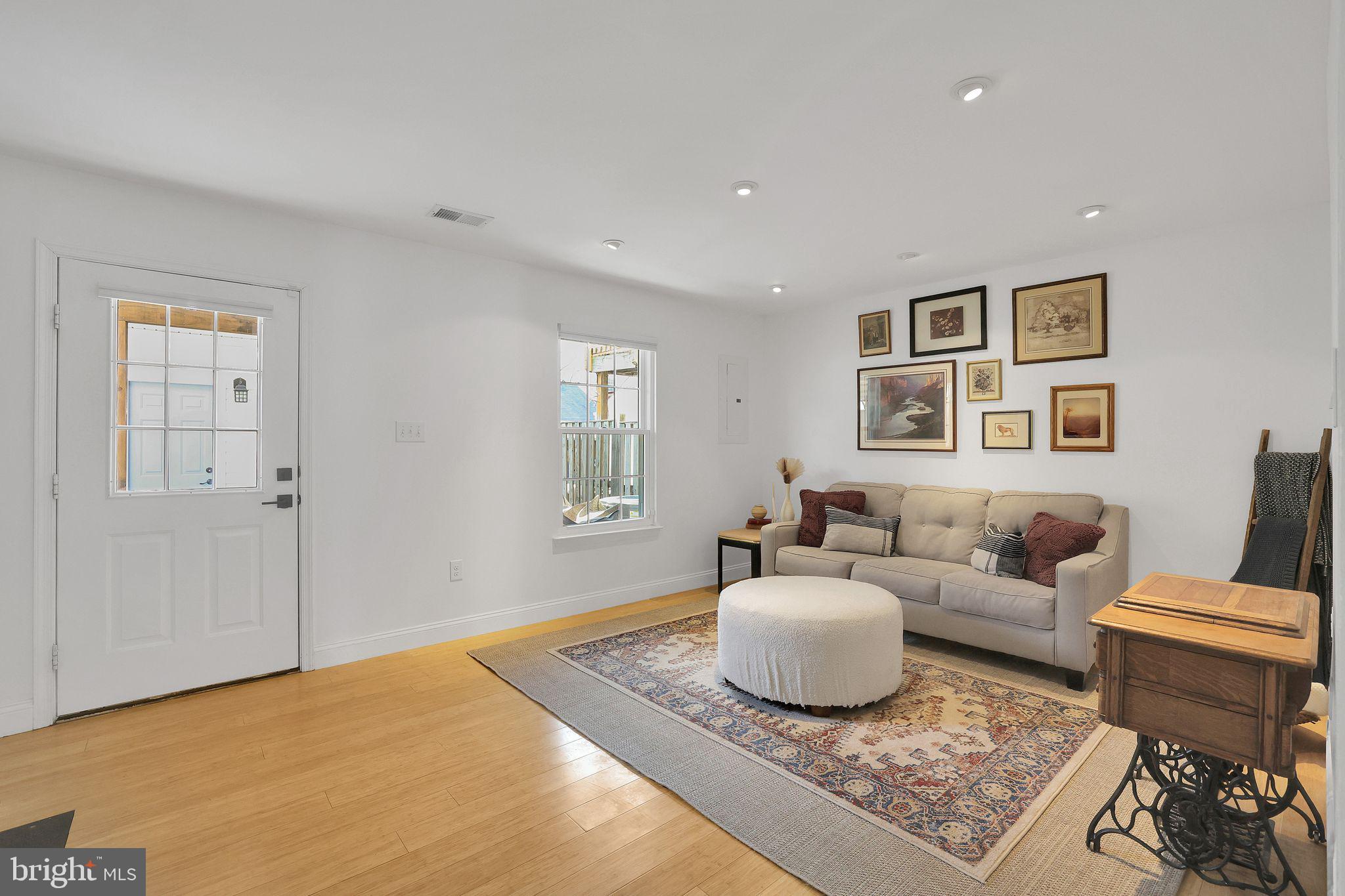 22952 Regent Terrace Sterling, VA 20166 - Photo 48 of 64 a living room with furniture and a window