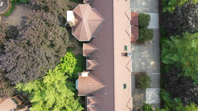 an aerial view of a house with mountain view