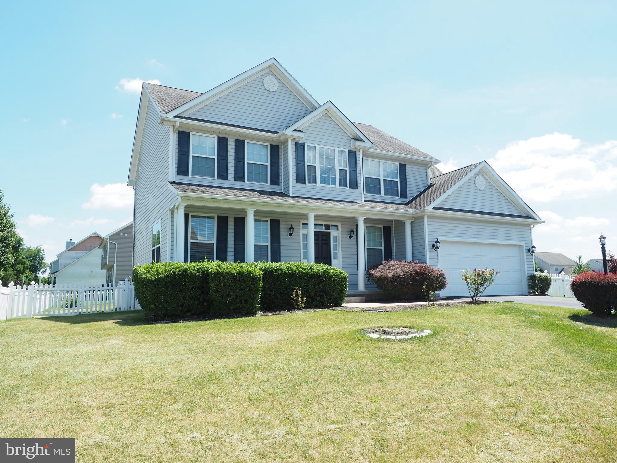 18 Solara Court Inwood, WV 25428 - Photo 1 of 24 a front view of a house with a yard