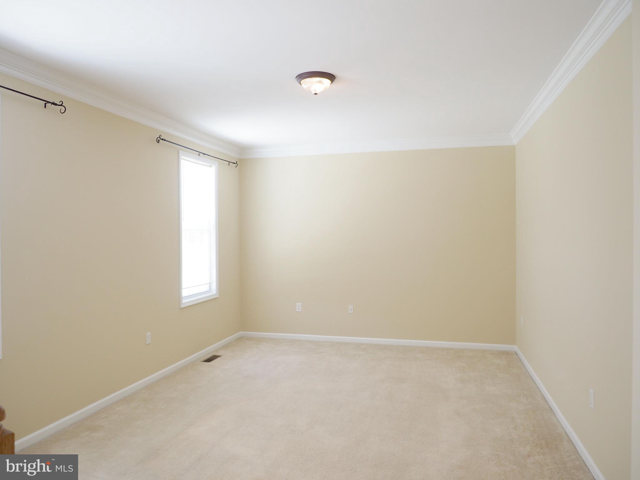 18 Solara Court Inwood, WV 25428 - Photo 12 of 24 a view of an empty room with a window