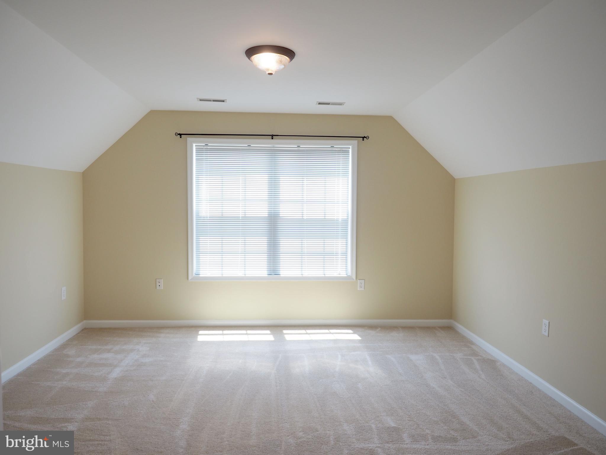 18 Solara Court Inwood, WV 25428 - Photo 14 of 24 an empty room with a window
