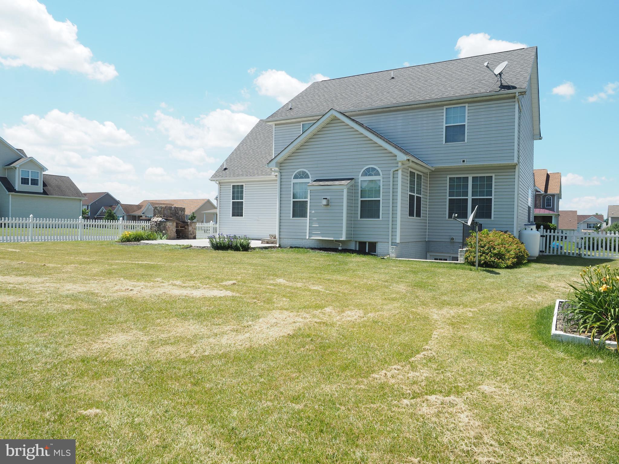 18 Solara Court Inwood, WV 25428 - Photo 24 of 24 a view of a house with a yard