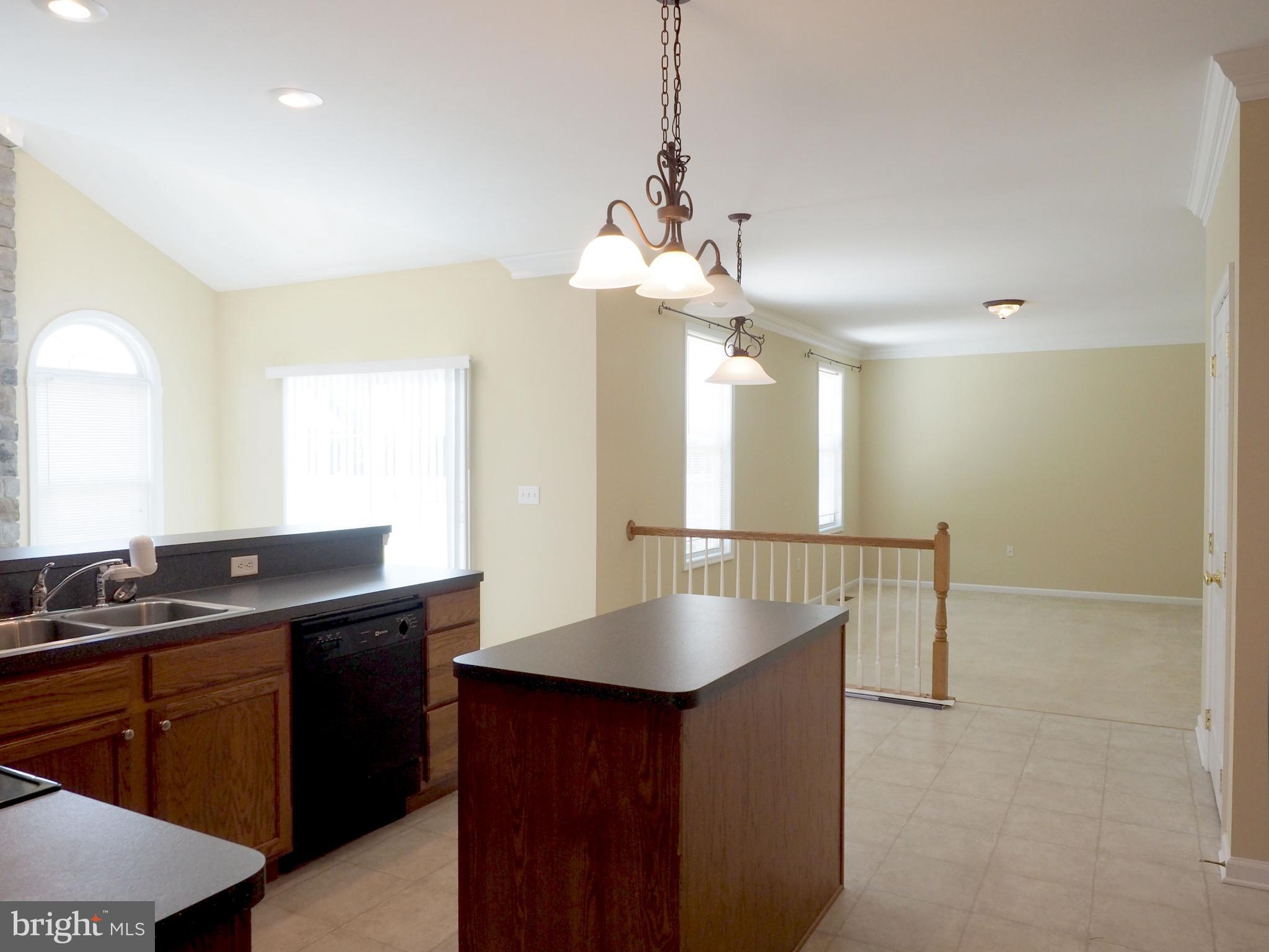 18 Solara Court Inwood, WV 25428 - Photo 5 of 24 a kitchen with counter top space and sink