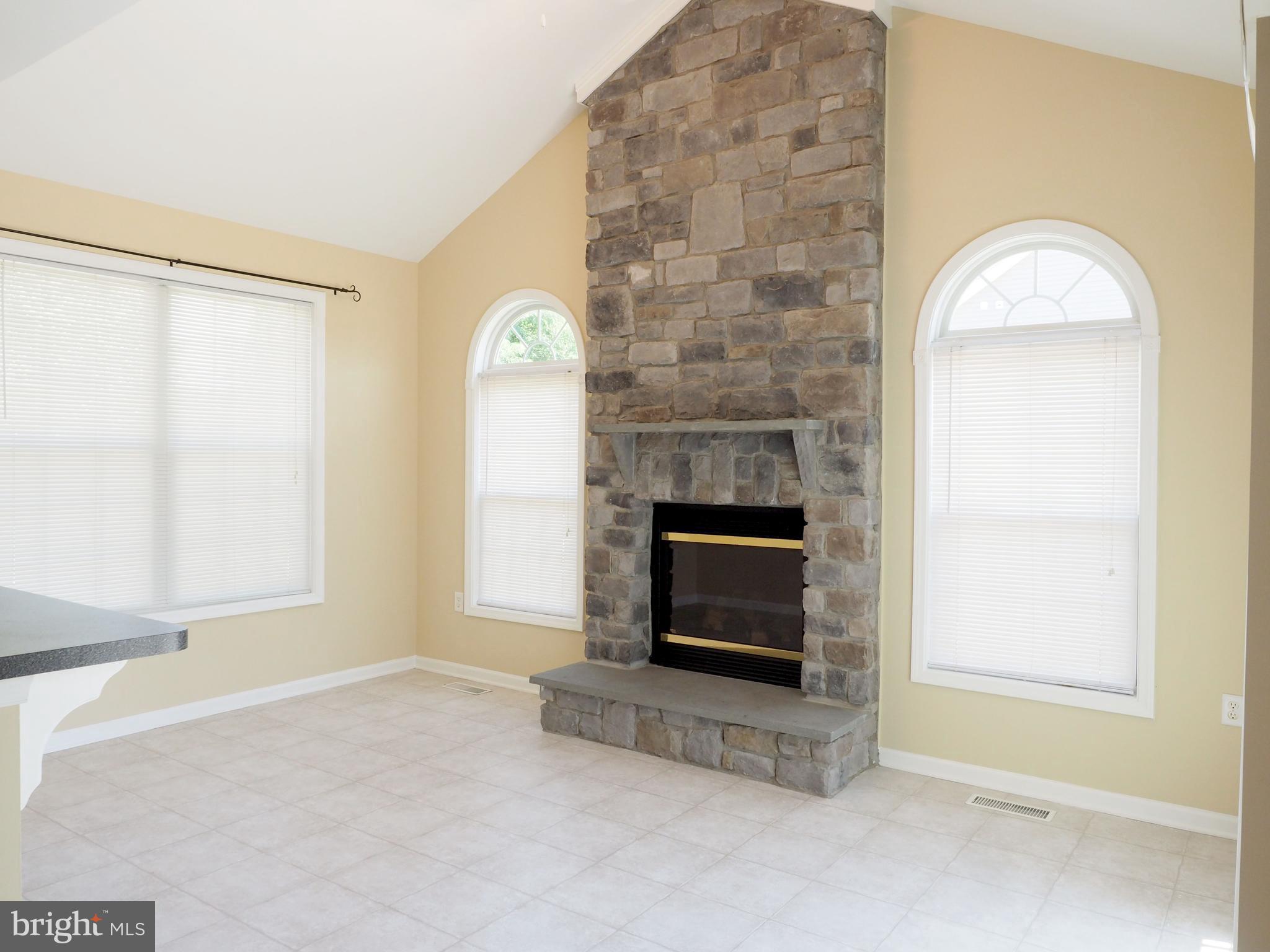18 Solara Court Inwood, WV 25428 - Photo 6 of 24 a view of empty room with a fireplace