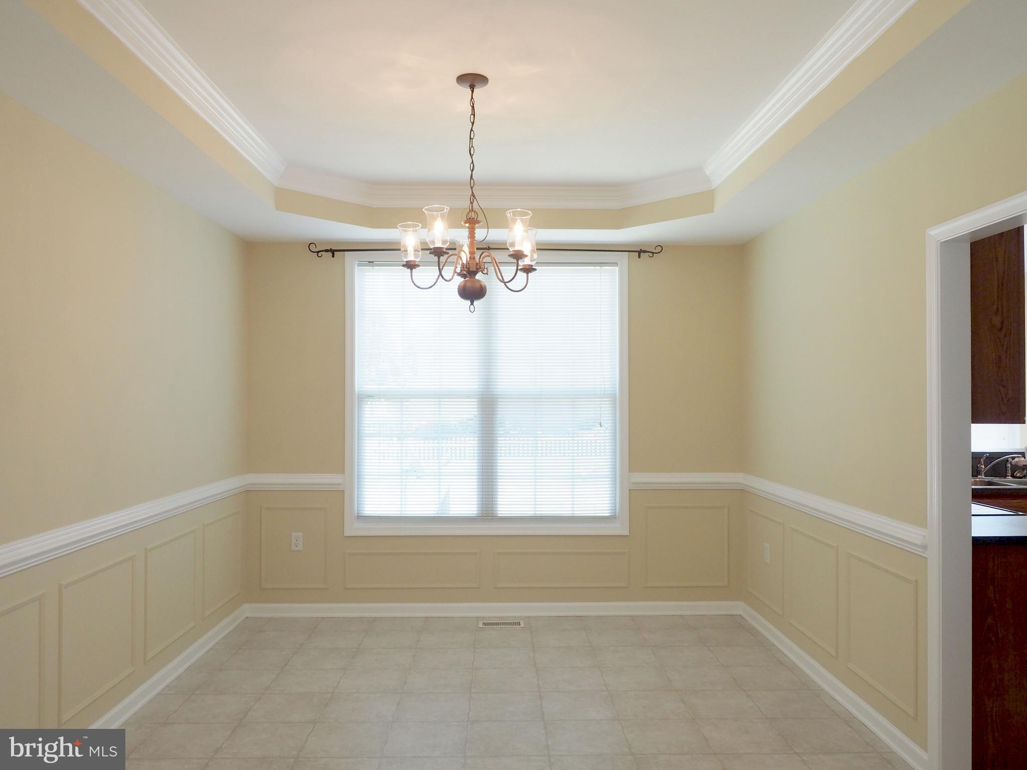 18 Solara Court Inwood, WV 25428 - Photo 8 of 24 a view of a livingroom with a chandelier