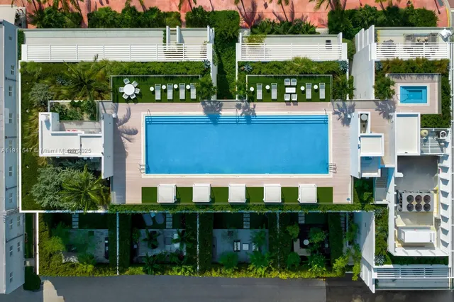 a view of swimming pool from a city view