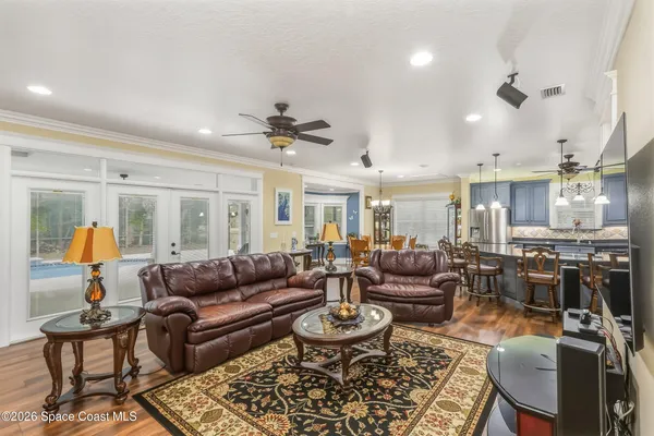 a bathroom with a tub a sink and a shower