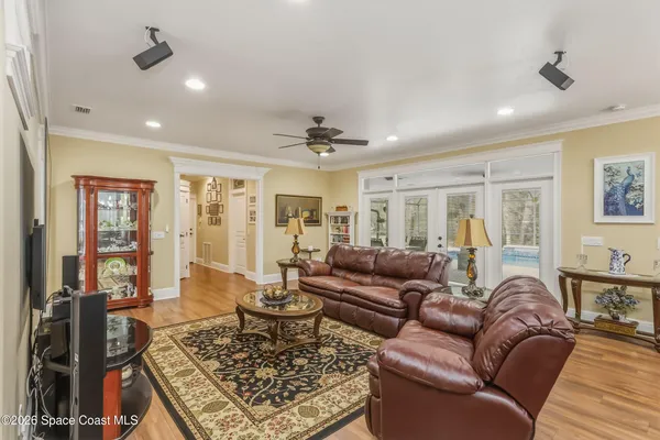 a bathroom with a tub shower and sink
