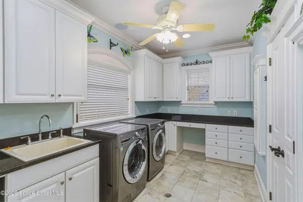 a dining room with furniture window and outside view