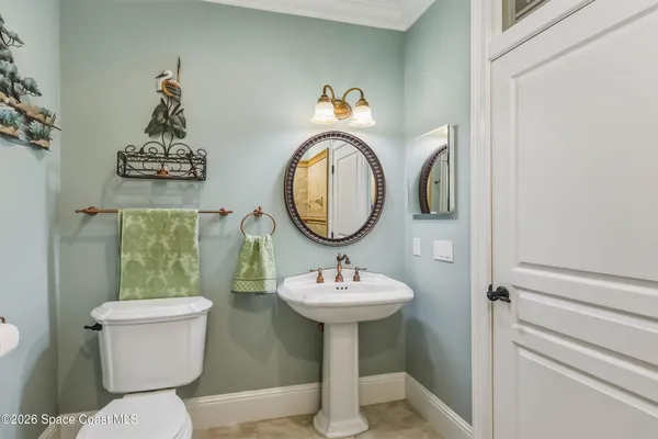 a view of a big house with a mountain in the background