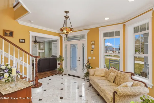 a kitchen with stainless steel appliances a sink and a refrigerator