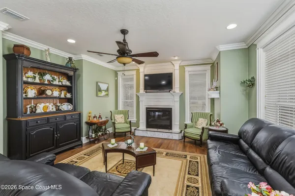 a kitchen with counter top space cabinets dining table and chairs