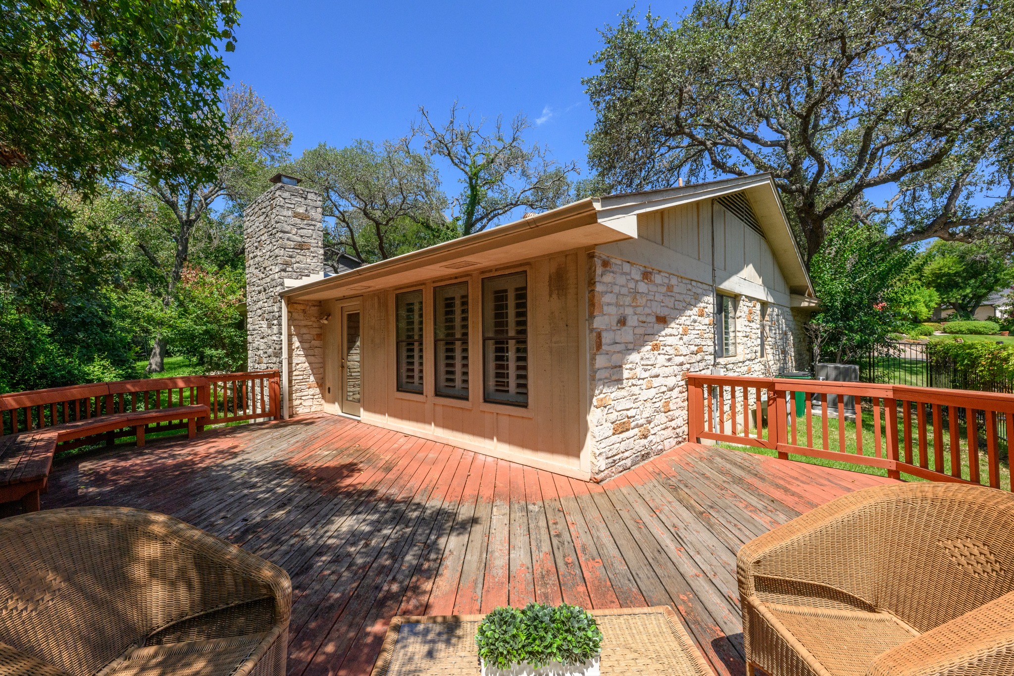1907 Stoneridge Road Austin, TX 78746 - Photo 31 of 36 Large rear deck provides plenty of space for outdoor dining and entertaining.