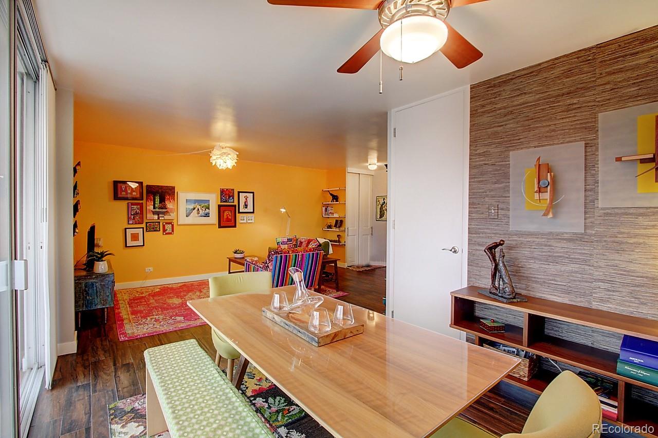 1200 Vine Street, Unit 4B Denver, CO 80206 - Photo 11 of 33 a living room with furniture and a table