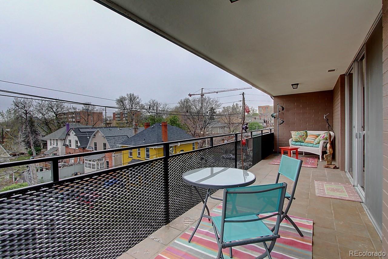 1200 Vine Street, Unit 4B Denver, CO 80206 - Photo 17 of 33 a view of a balcony with chairs