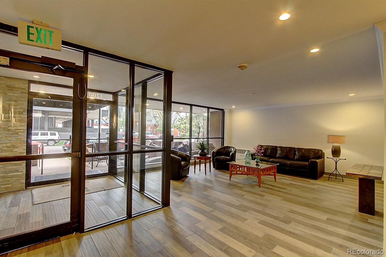 1200 Vine Street, Unit 4B Denver, CO 80206 - Photo 30 of 33 a living room with furniture