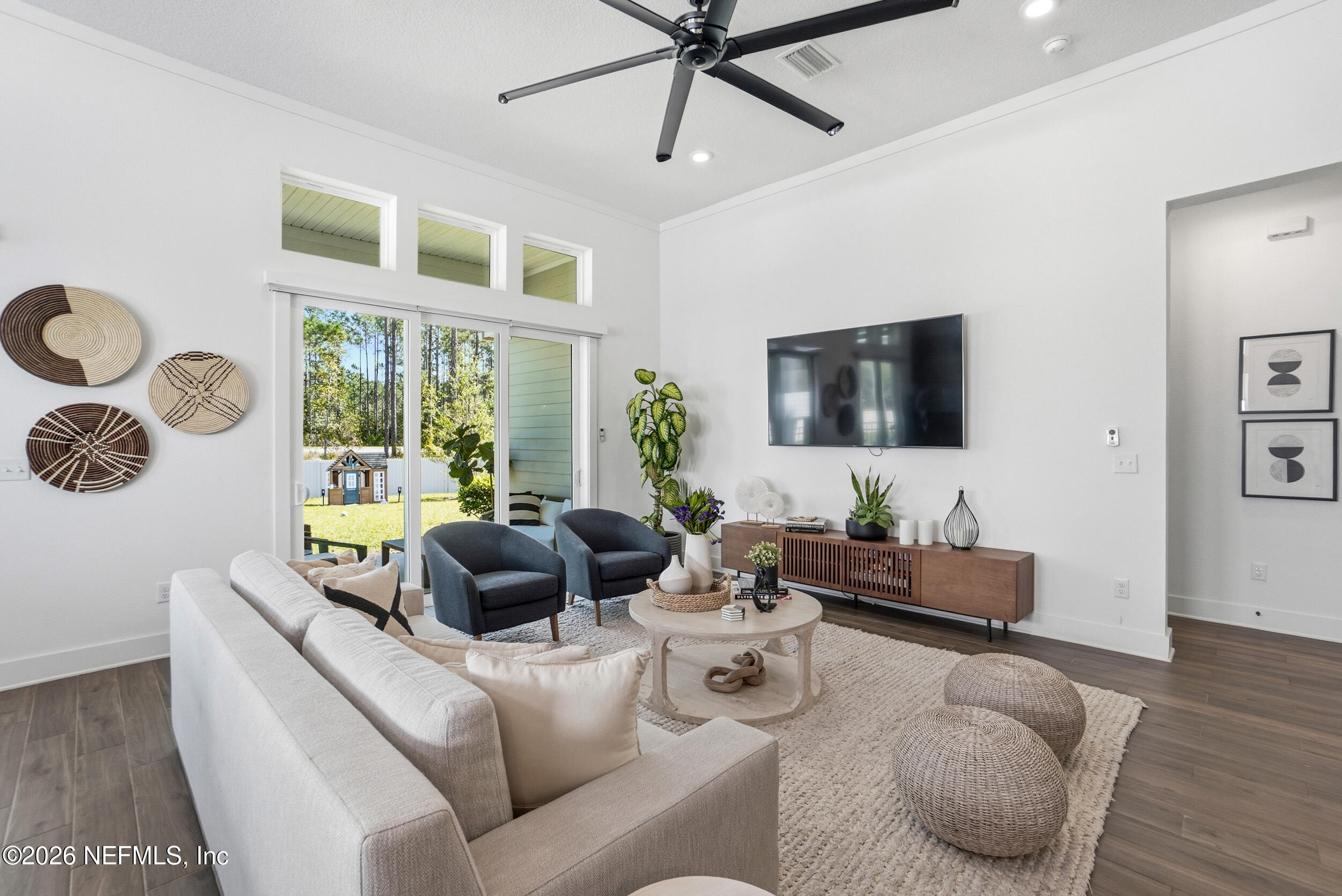 728 Navigators Road St. Johns, FL 32259 - Photo 14 of 38 a living room with furniture and a large window
