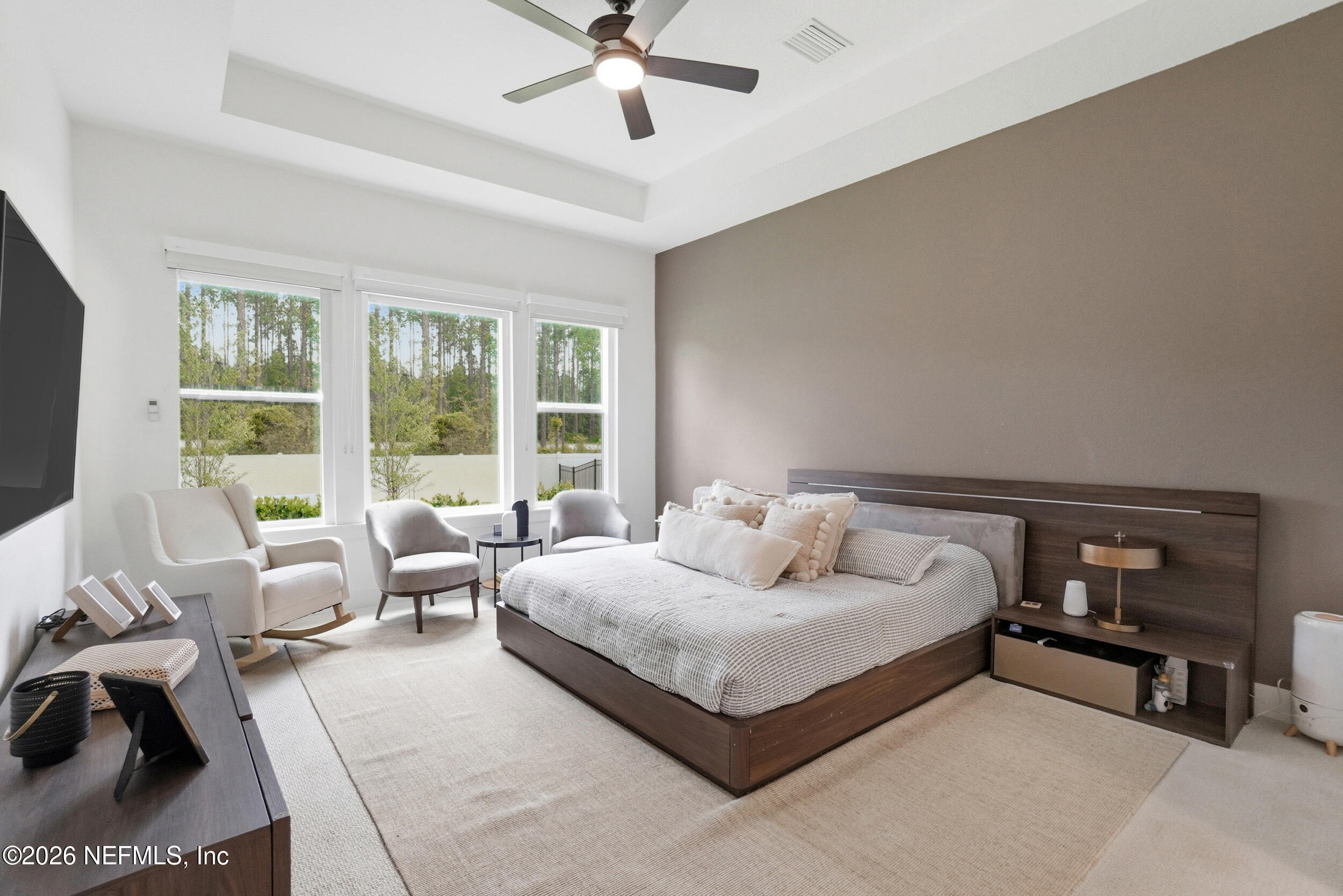 728 Navigators Road St. Johns, FL 32259 - Photo 15 of 38 a bedroom with a bed and a couch