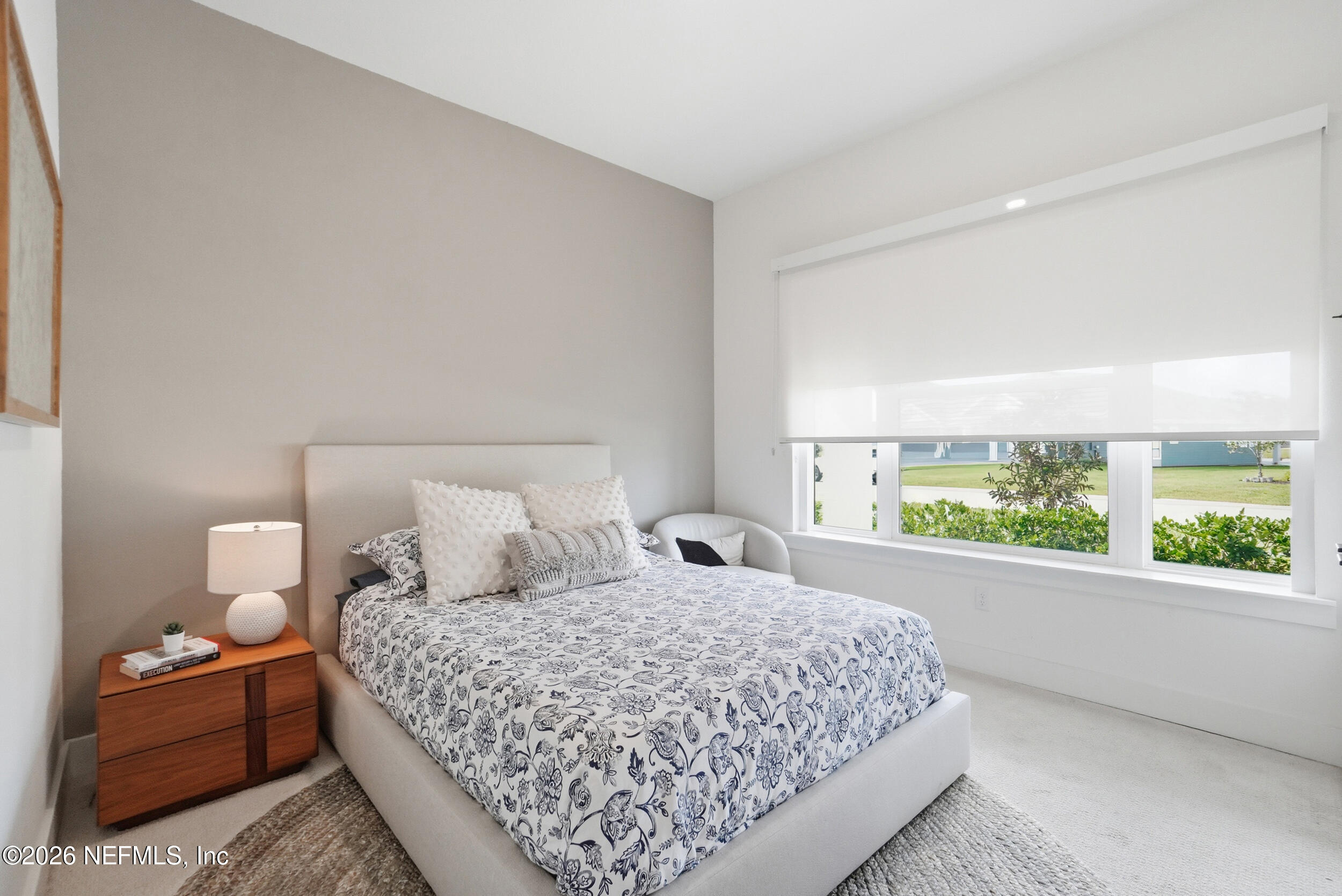 728 Navigators Road St. Johns, FL 32259 - Photo 21 of 38 a bedroom with a bed and window