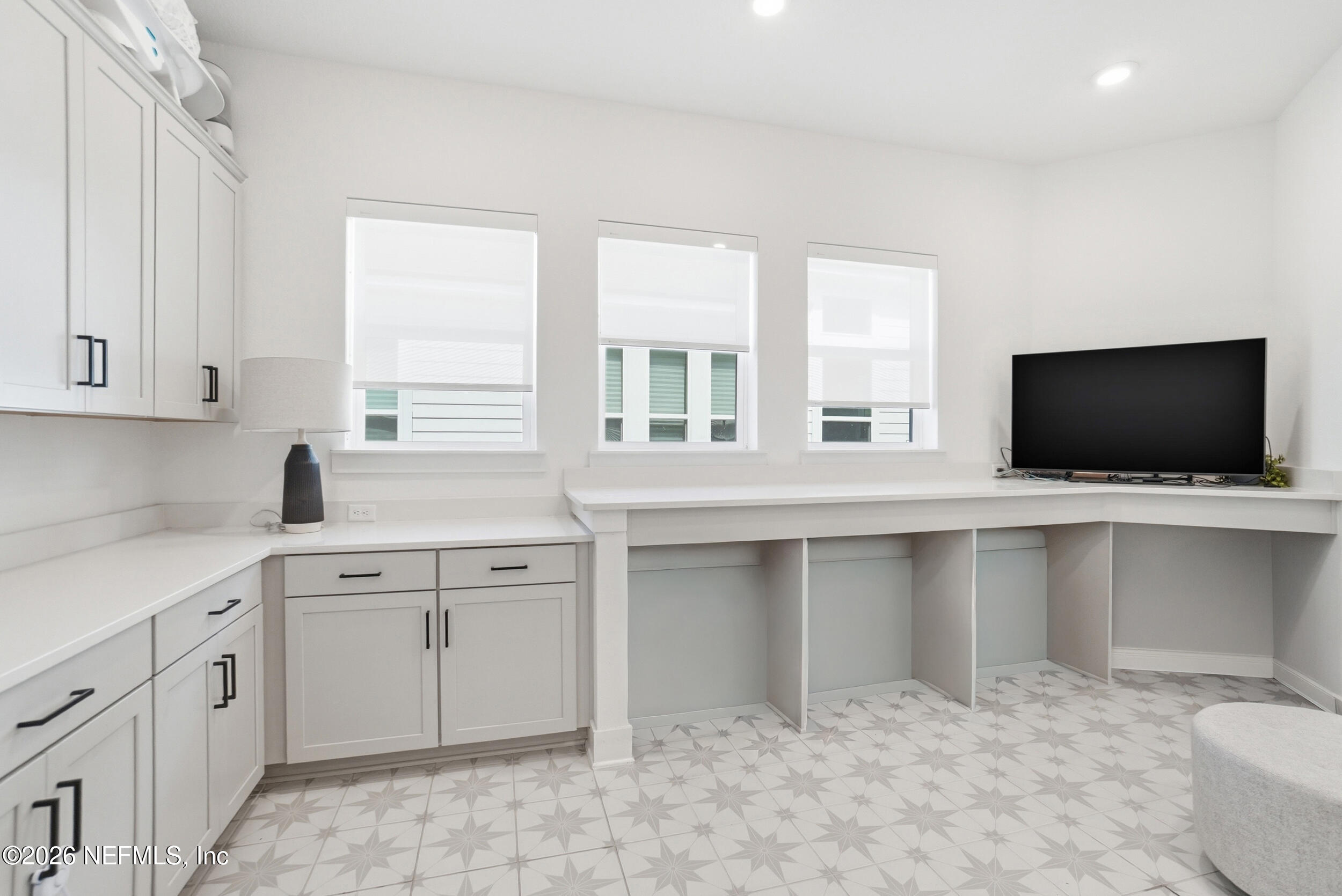 728 Navigators Road St. Johns, FL 32259 - Photo 22 of 38 a view of a kitchen with a sink and a microwave
