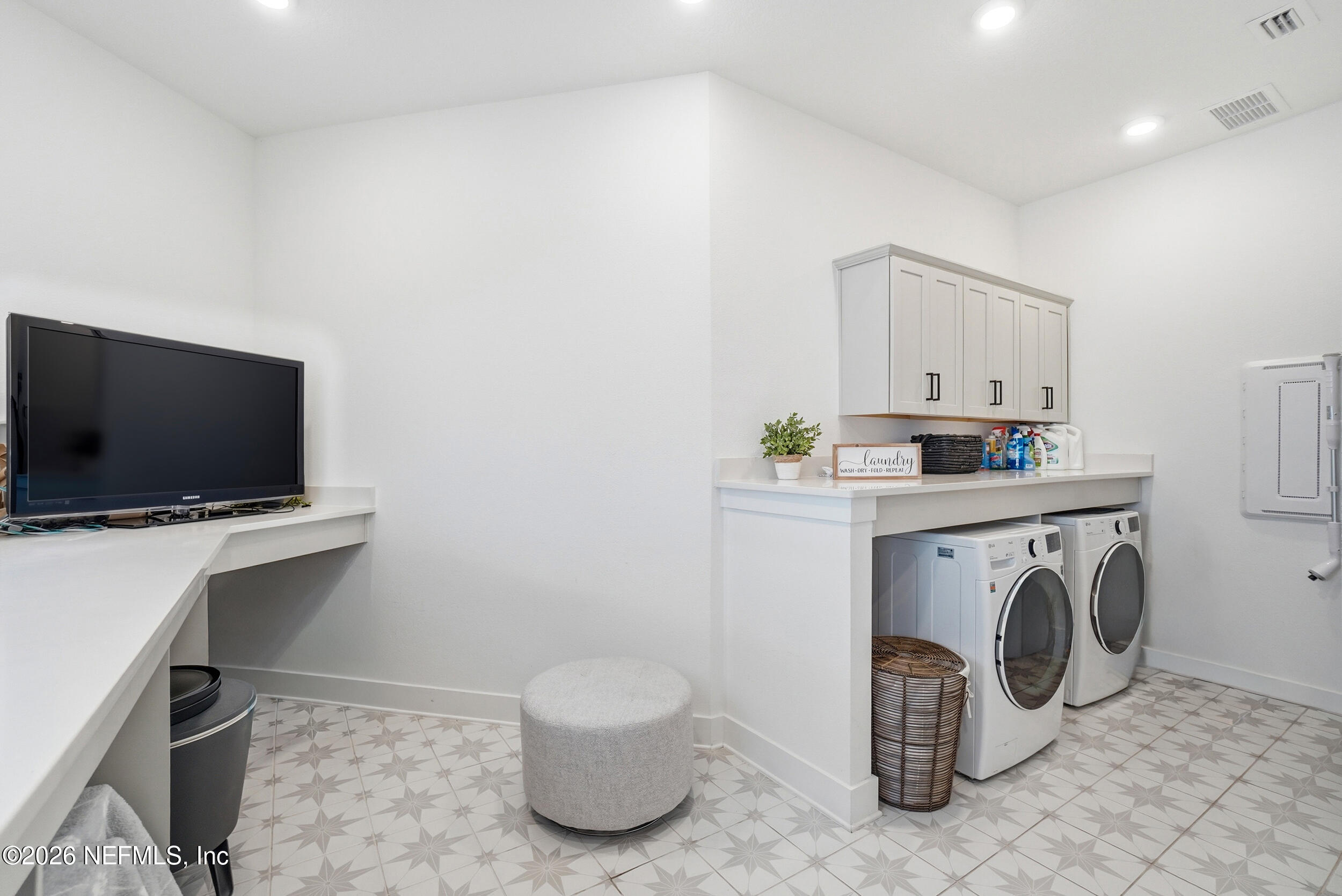 728 Navigators Road St. Johns, FL 32259 - Photo 23 of 38 a utility room with dryer and washer