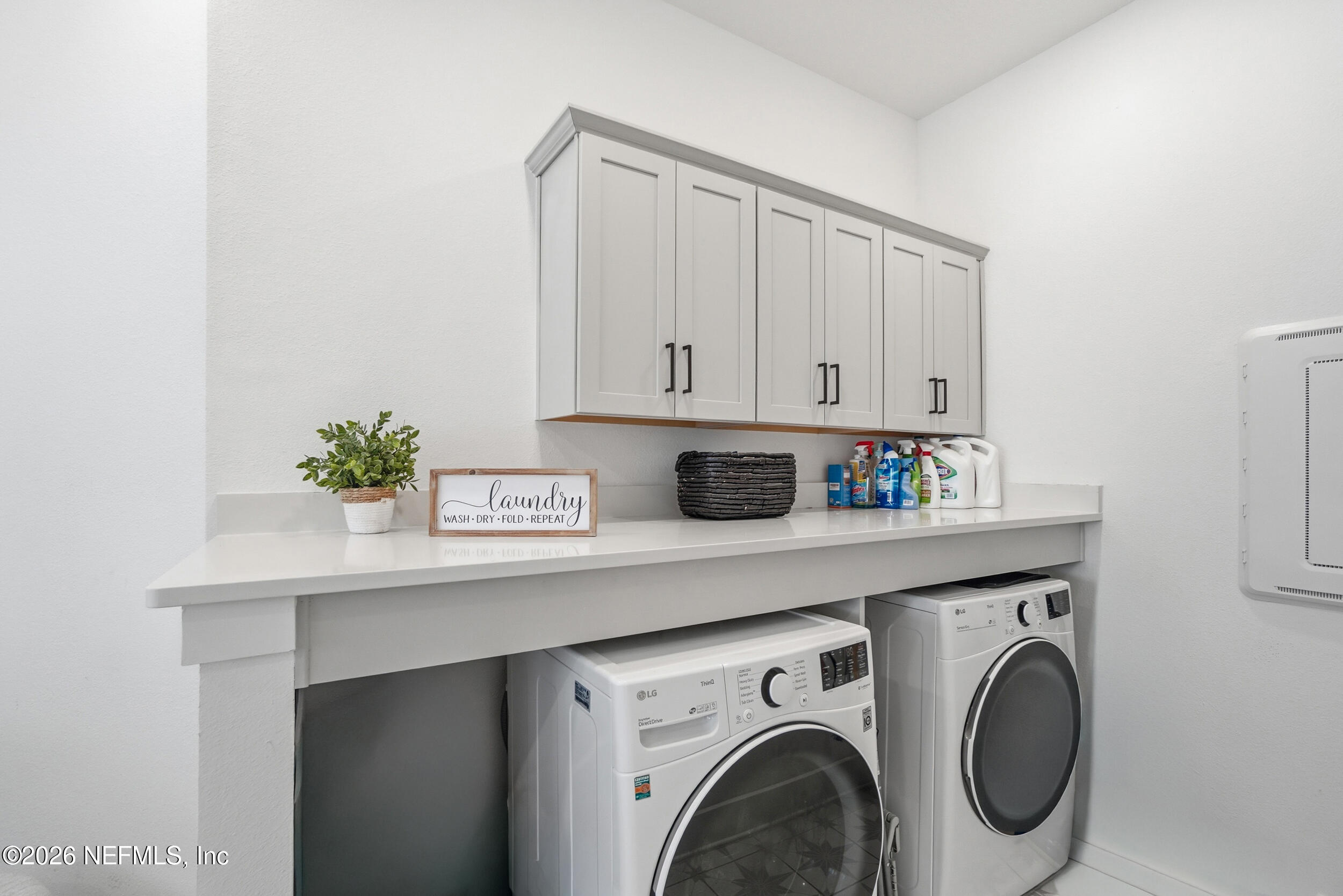 728 Navigators Road St. Johns, FL 32259 - Photo 24 of 38 a utility room with dryer and washer