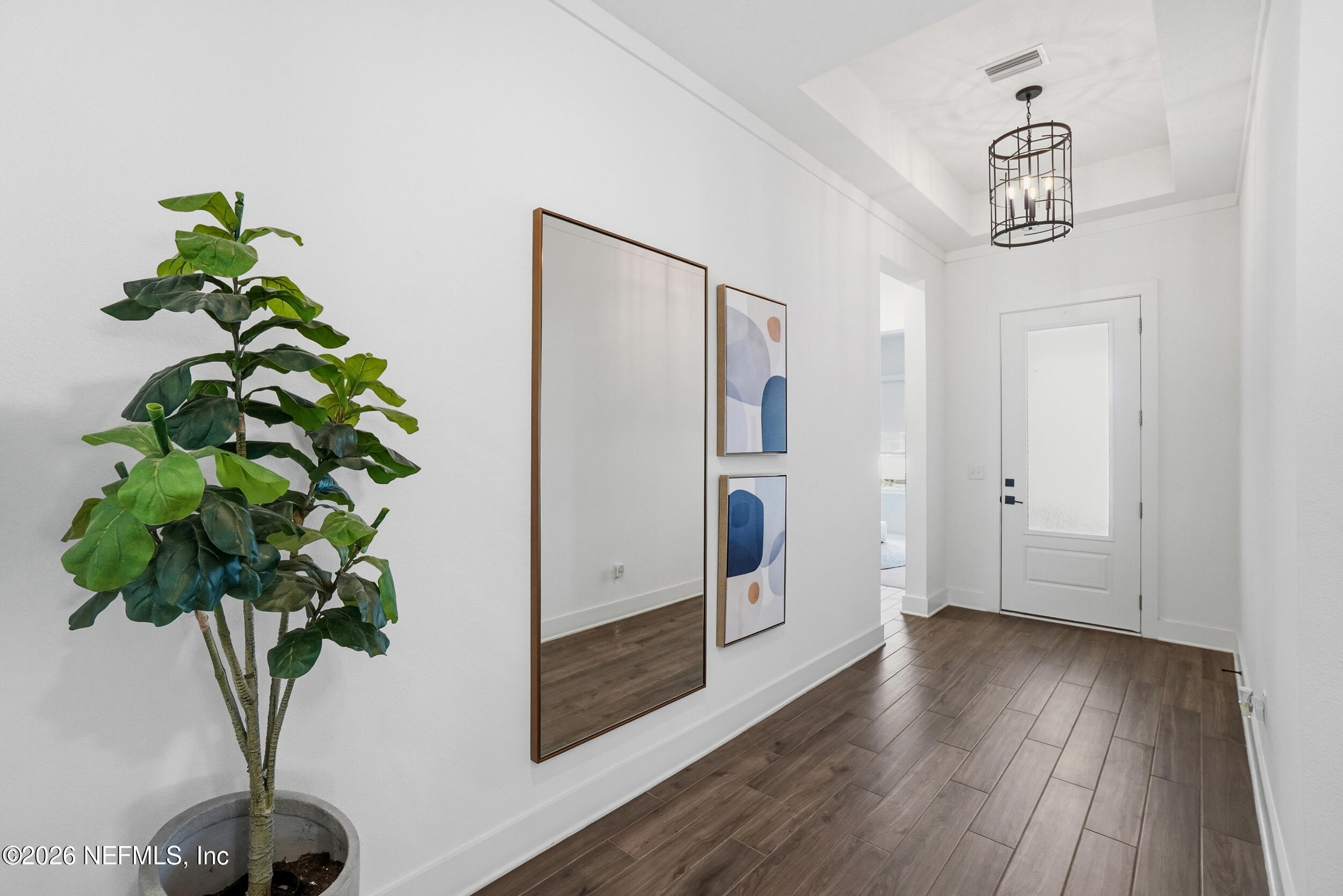 728 Navigators Road St. Johns, FL 32259 - Photo 3 of 38 a view of entryway with wooden floor