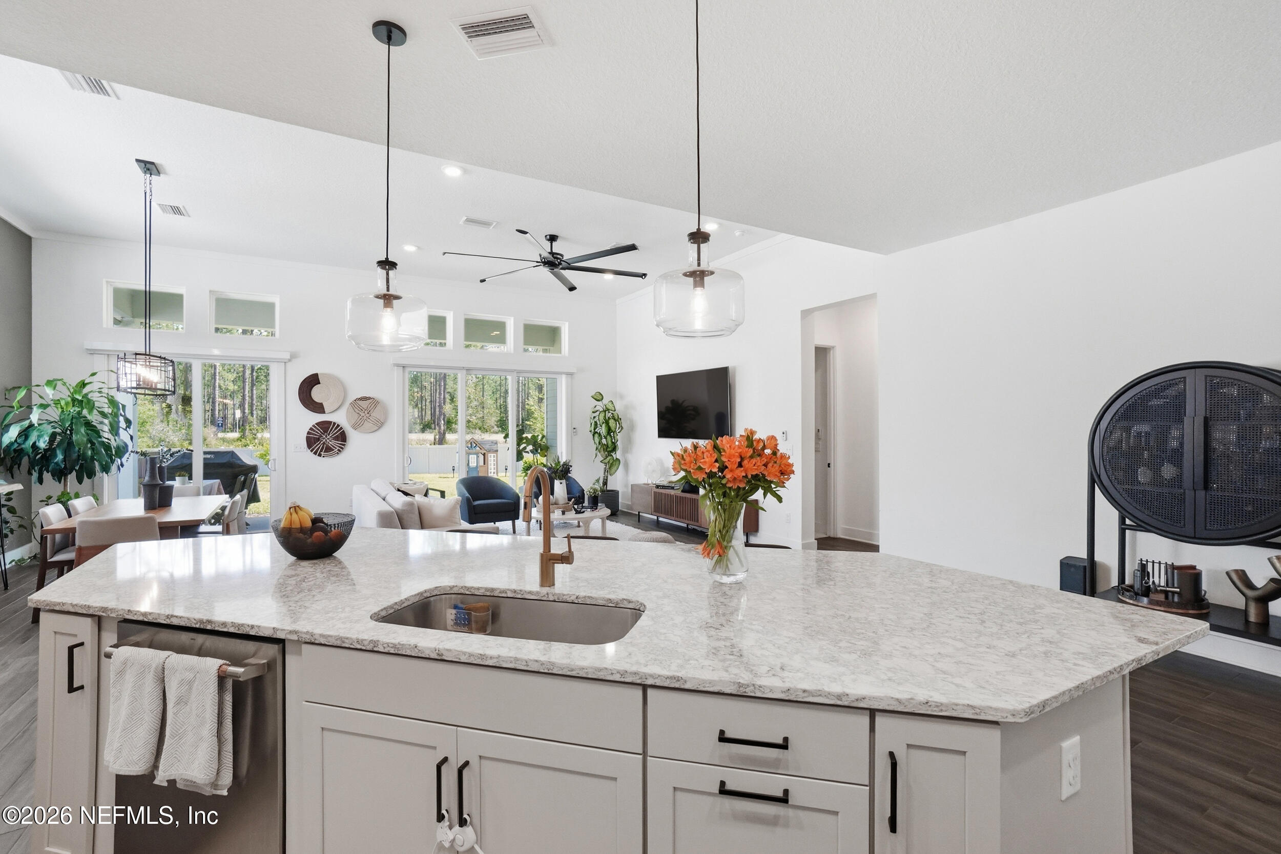 728 Navigators Road St. Johns, FL 32259 - Photo 7 of 38 a kitchen with sink and refrigerator