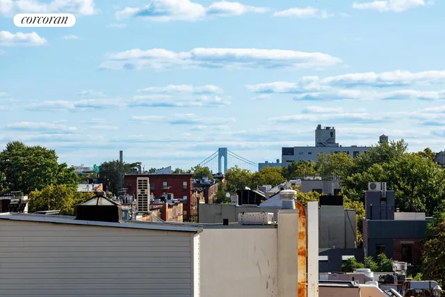 a view of city with tall buildings