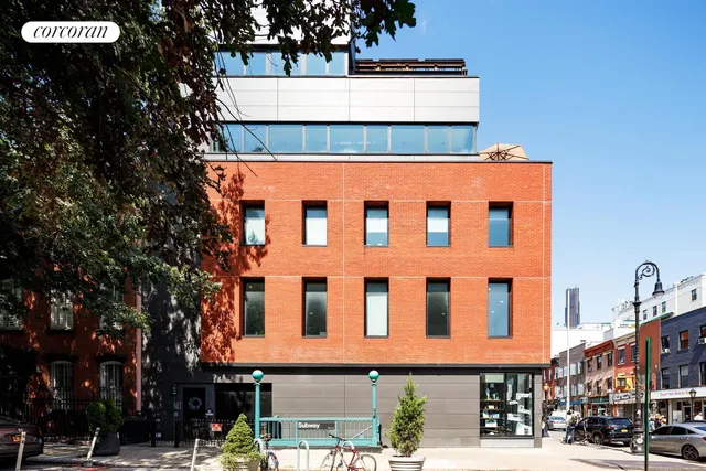 a front view of a building with street