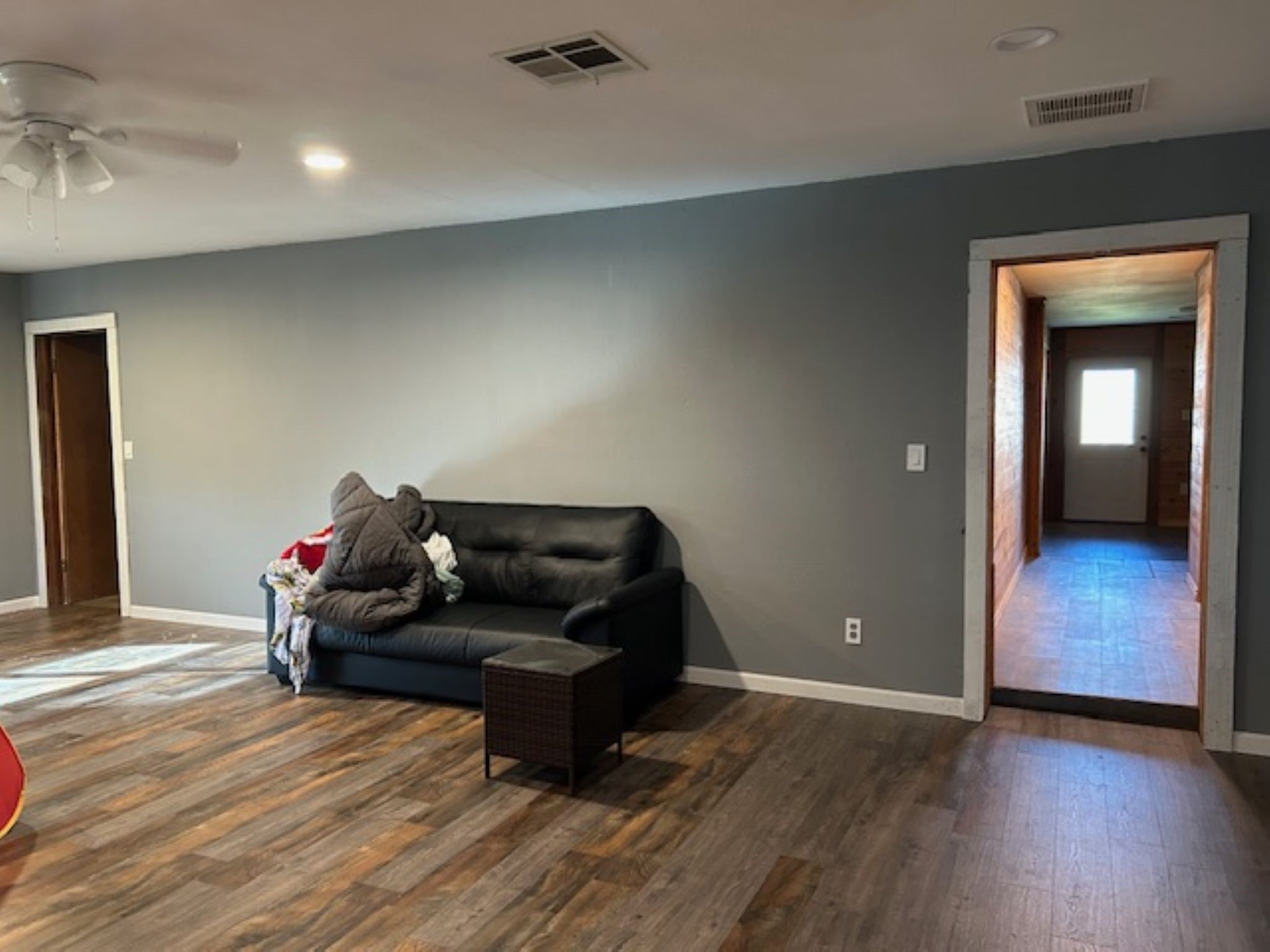 34743 Betka Road Waller, TX 77484 - Photo 10 of 20 a living room with furniture and a wooden floor