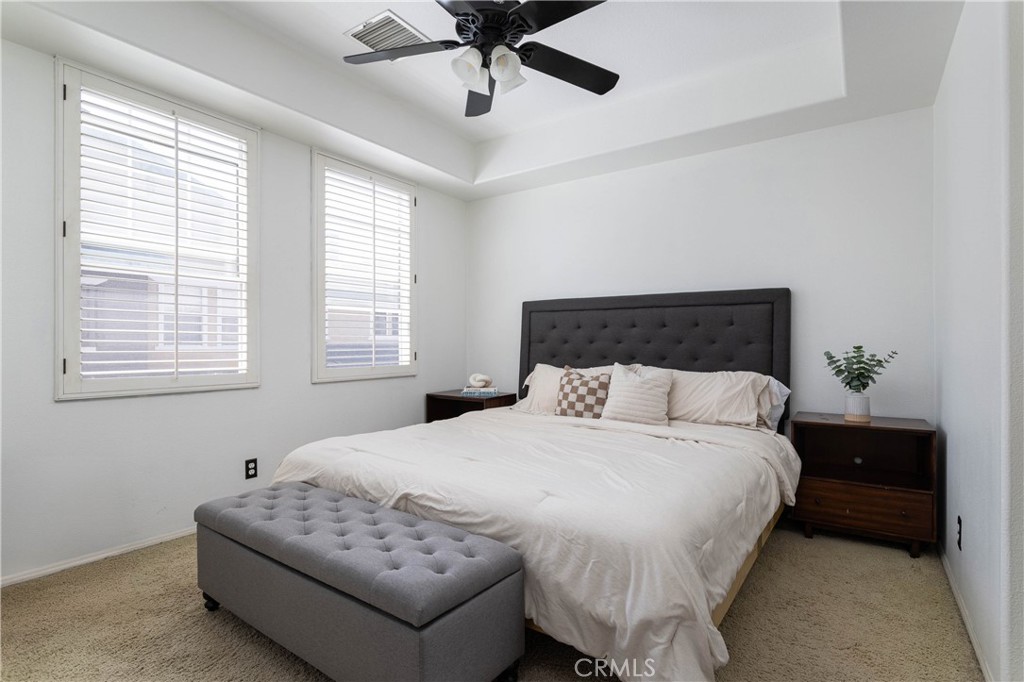 42 Chadron Circle Ladera Ranch, CA 92694 - Photo 12 of 27 a bedroom with bed and window