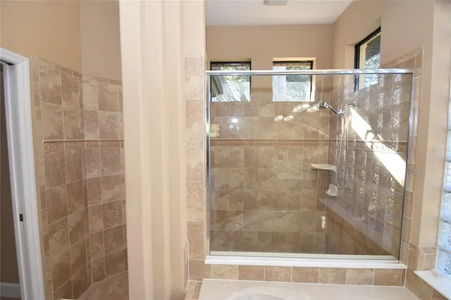 a view of gallery with wooden floor