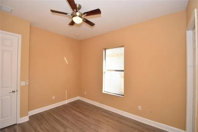 a view of a park with swings and slides